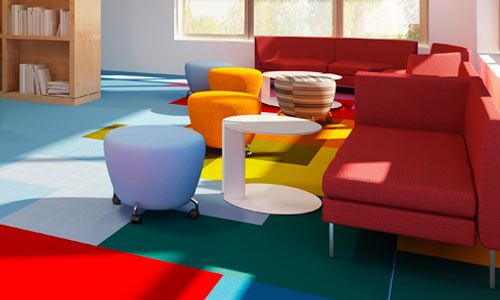 Clean school with colourful sofas